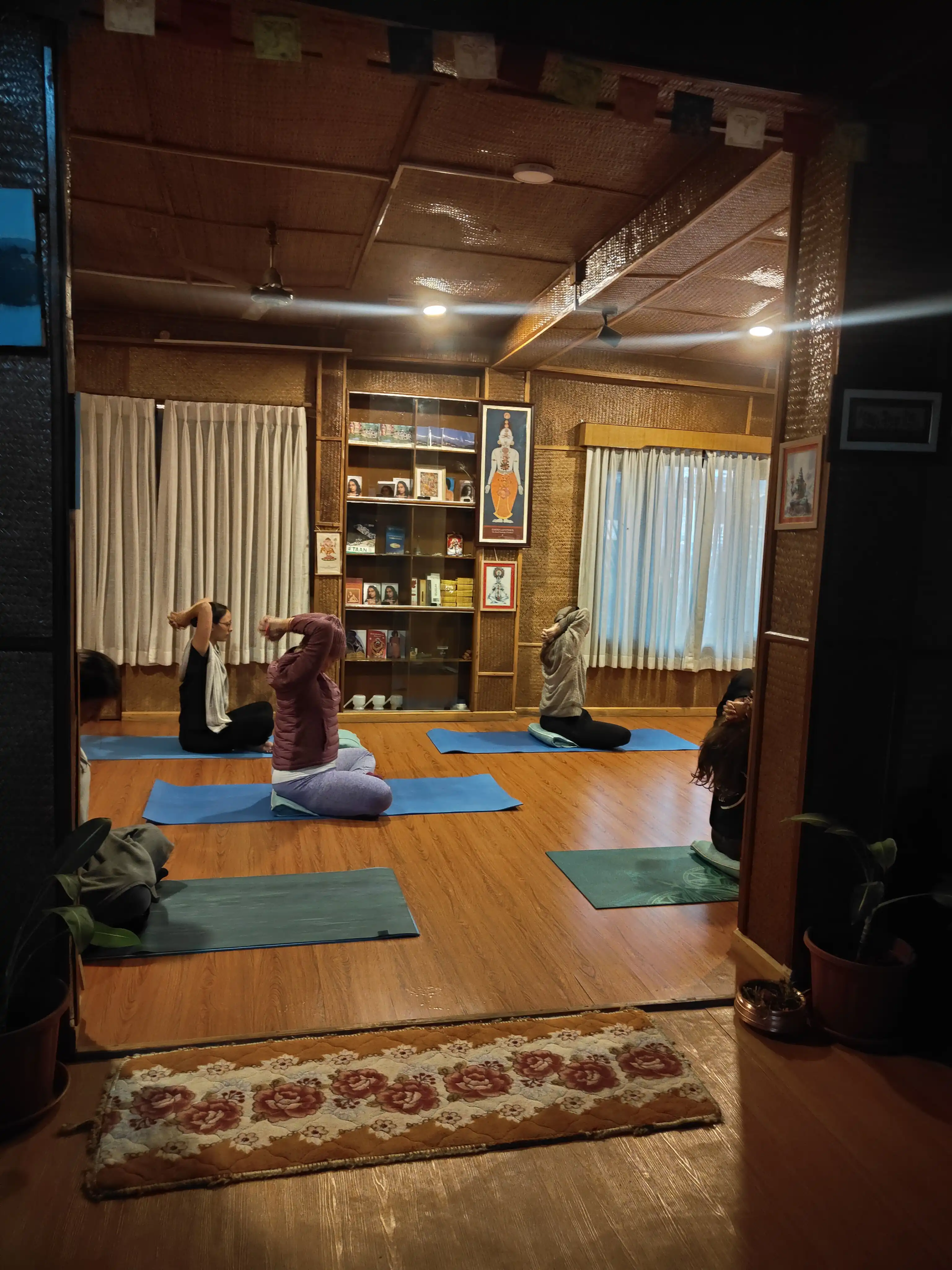 Sunrise yoga practice at our Pokhara retreat center