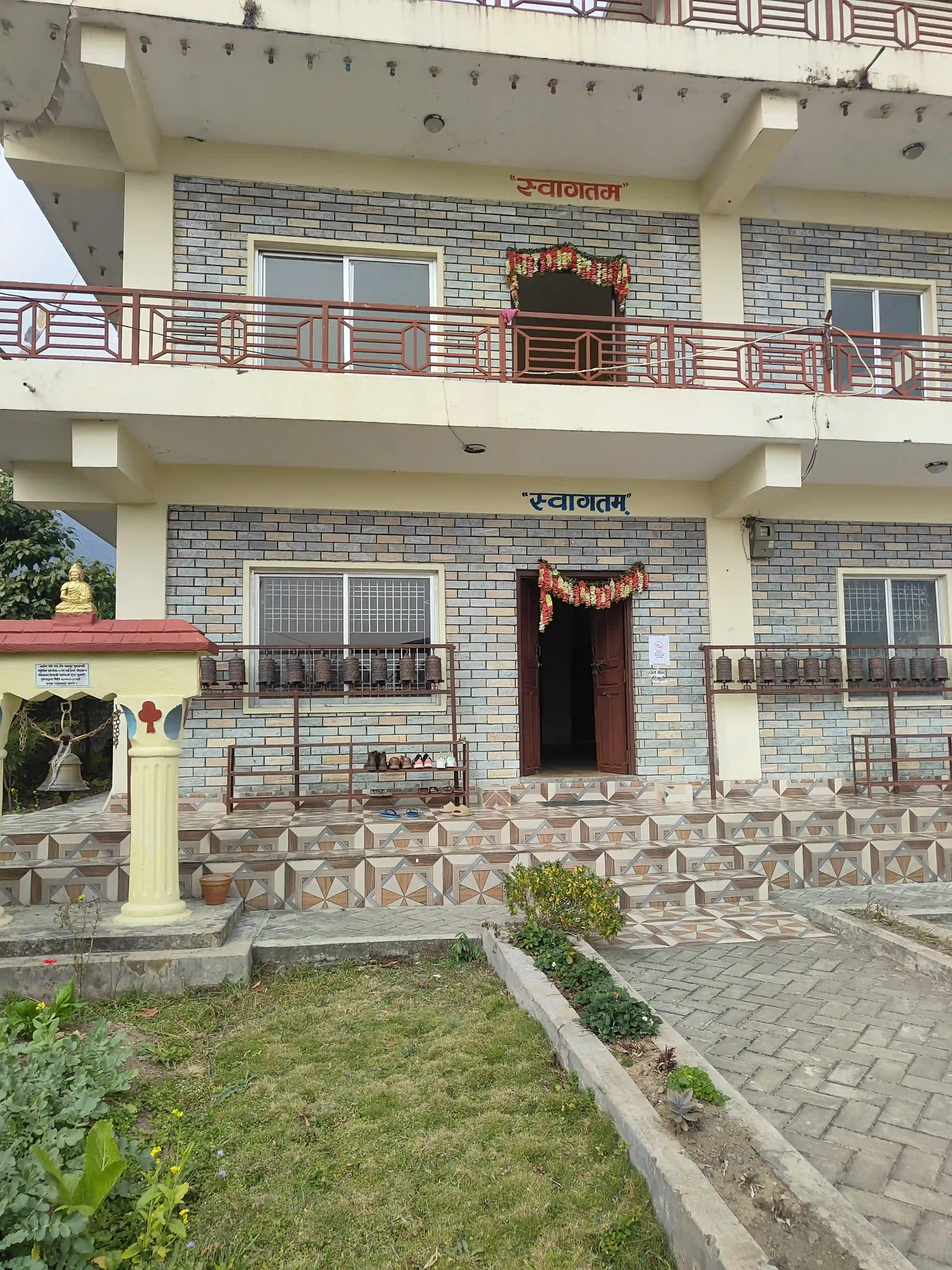 Stupa and prayer flag courtyard near our Ghachowk yoga retreat